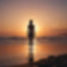 A powerful silhouette of a woman standing tall against a sunset.