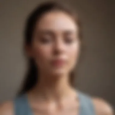 Inner Stillness: Embracing Calmness Individual engaged in a meditative pose with serene expression